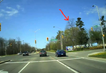 Watch a Golf Ball Leave Glen Abbey Golf Club and Hit a Moving Car
