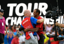 Questions: Tiger Woods Talks Pops, Pain, Tears, and the Internet Joe LaCava congratulates Tiger Woods