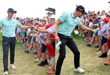 4 Photos: Young Fan Works Hard For a Henrik Stenson Fist Bump